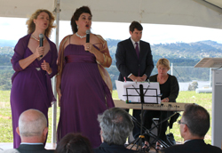 Left: Christina Wilson ad Louise Page singing for the guests.