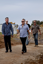 Left: Jeremy Lasek escorts Jimmy Barnes to the tree planting ceremony.