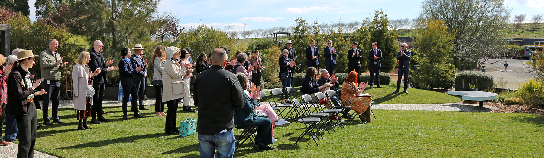 The crowd applauding as the art biennial is officially launched