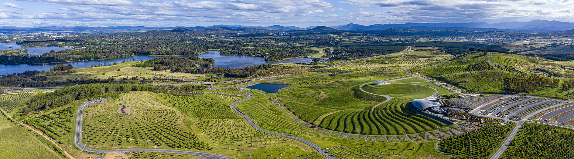 Aerial view of the Visitors Centre, Central Vally and the view of Canberra in the background