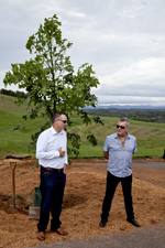 Left: Chief Minister Jon Stanhope MLA with Jimmy Barnes at the planting of the Flame Tree.