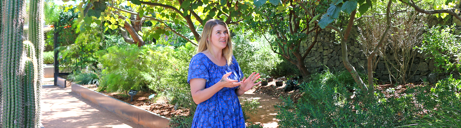 Amalie Shawcross photogrpahed in the Discovery Garden, side on talking
