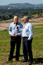 Chairman of the National Arboretum Canberra Board, John Mackay, interviews sports star Robert de Castella. Click for larger image.