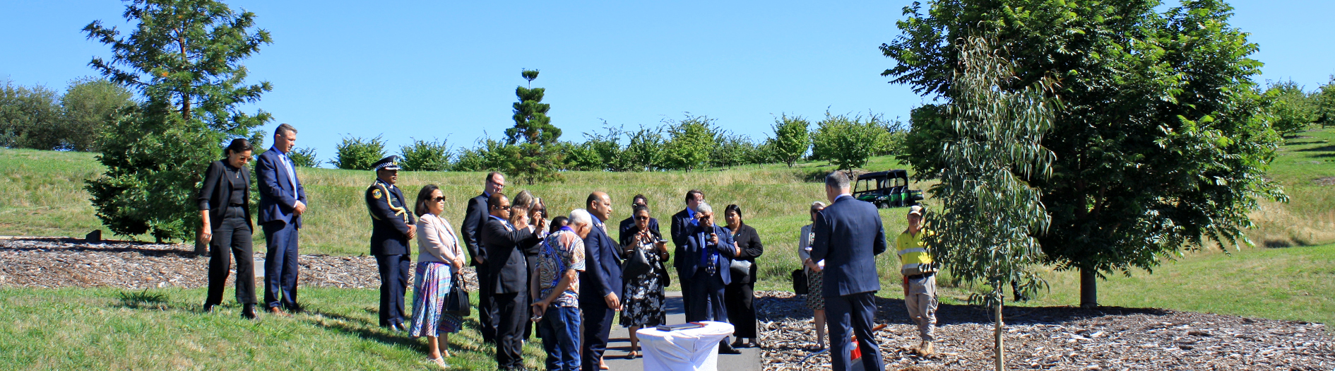 Group of dignitaries listening to speeches