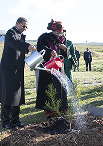 Web Pres Tanzania and wife watering crop